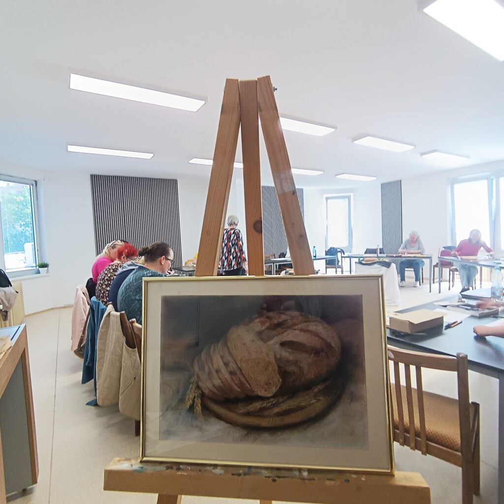 Kresba zátišia chleba suchým pastelom 